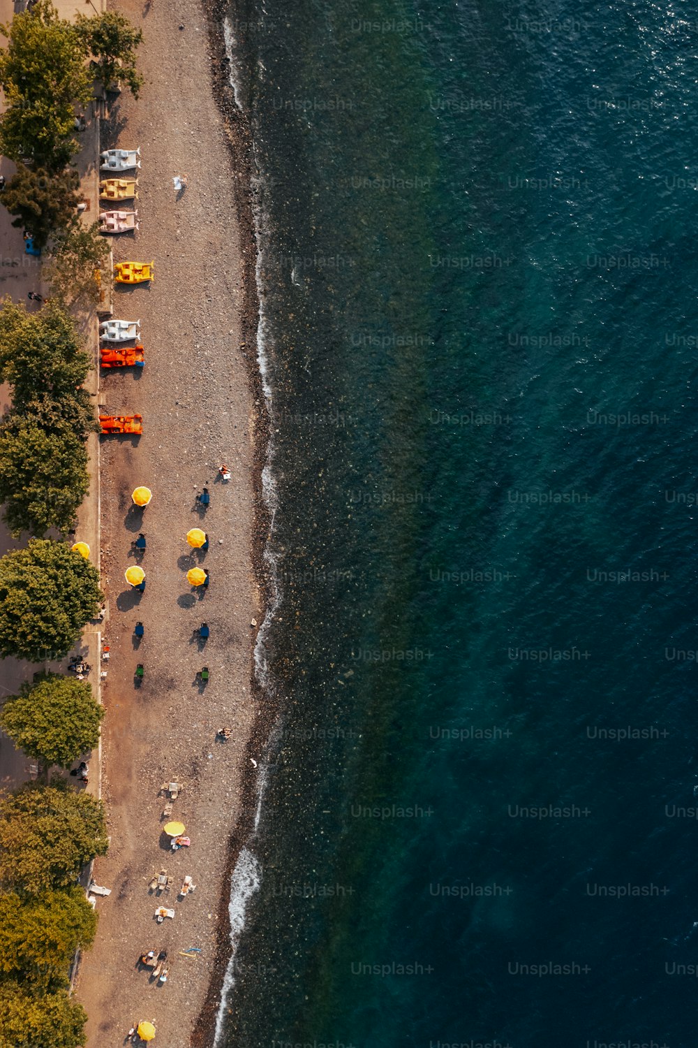 an aerial view of a beach and a body of water