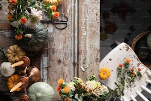 a table topped with lots of different types of flowers