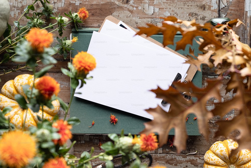 a piece of paper sitting on top of a pile of flowers