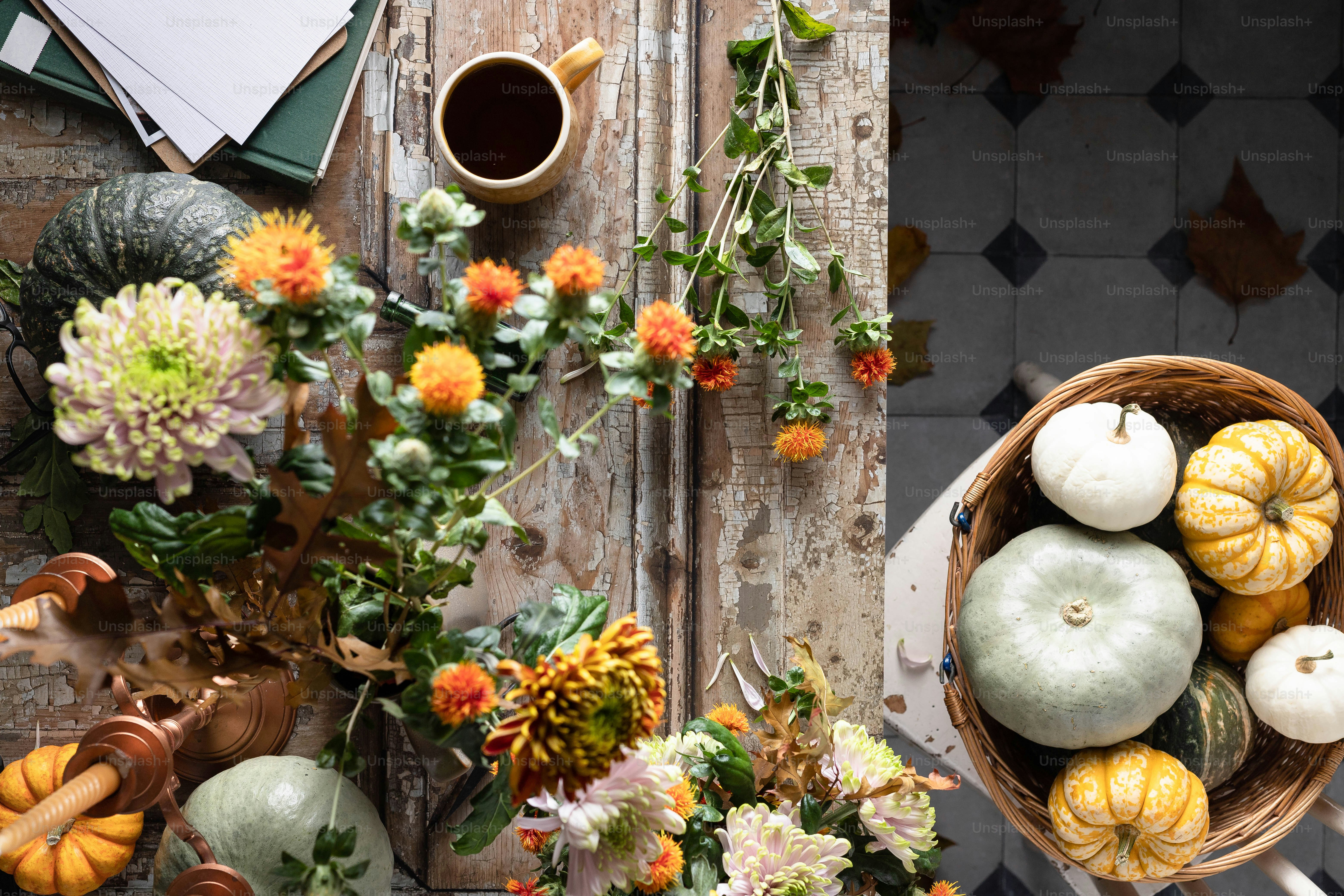 a basket filled with lots of different types of pumpkins