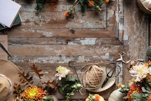 a table topped with lots of different types of flowers