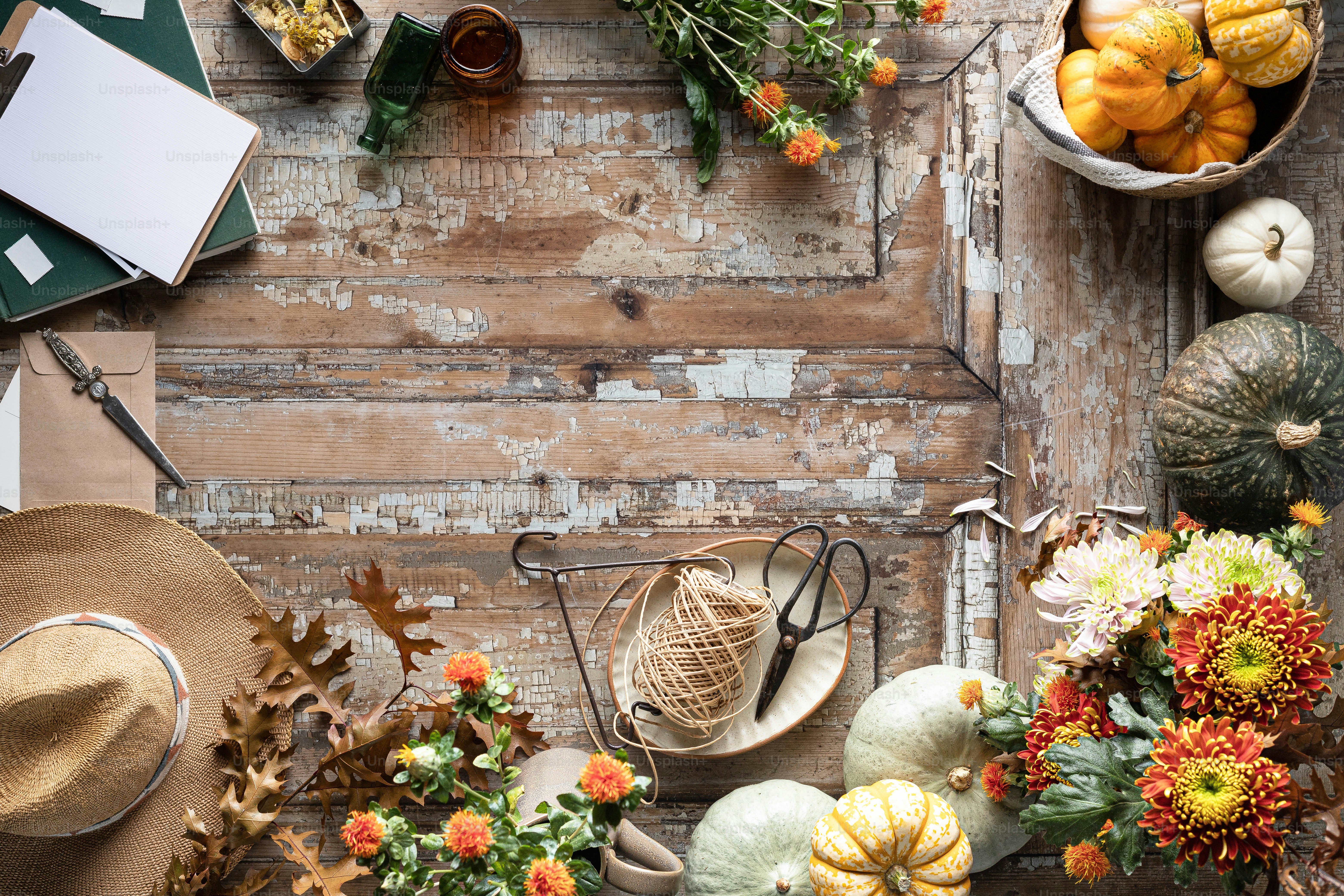 a table topped with lots of different types of flowers