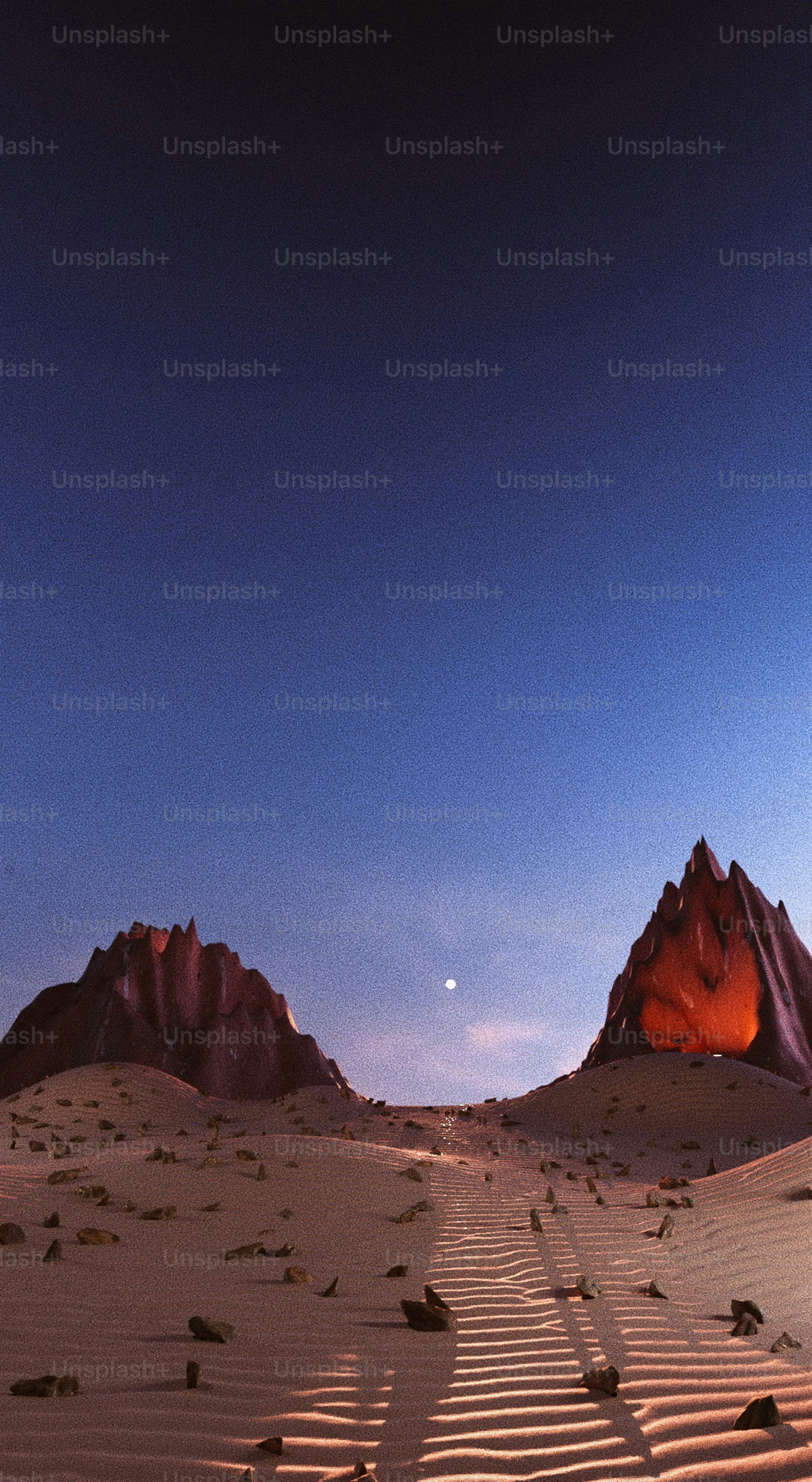 a view of a desert with mountains in the background