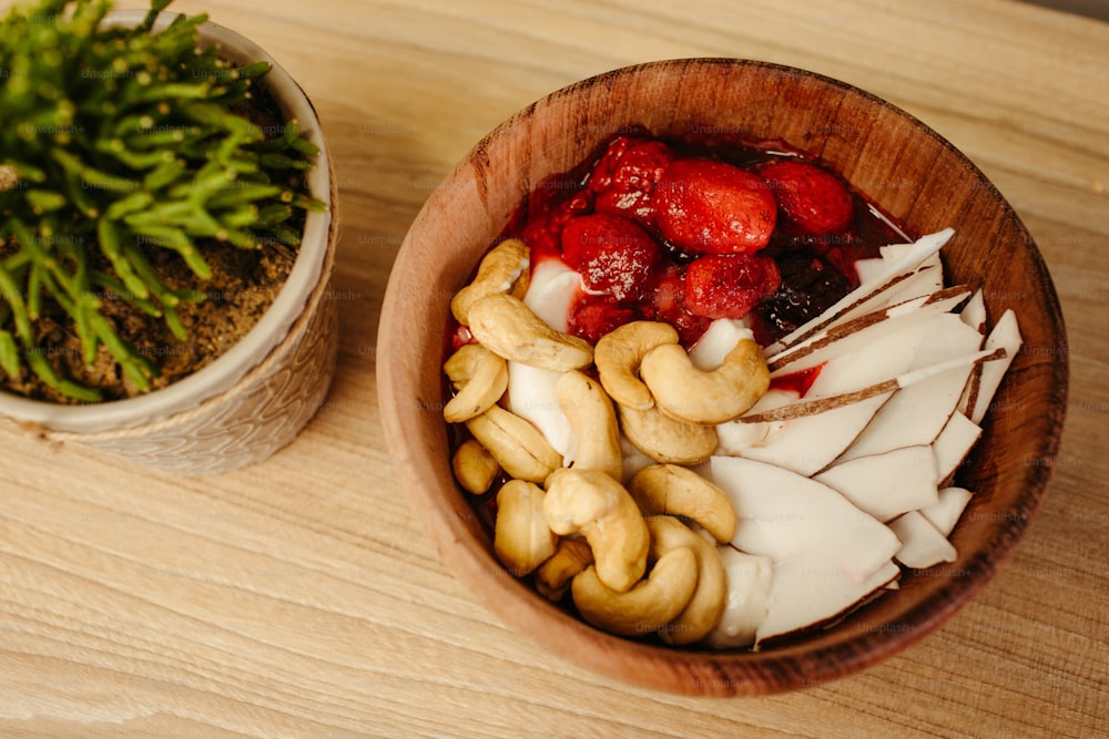 a wooden bowl filled with different types of food