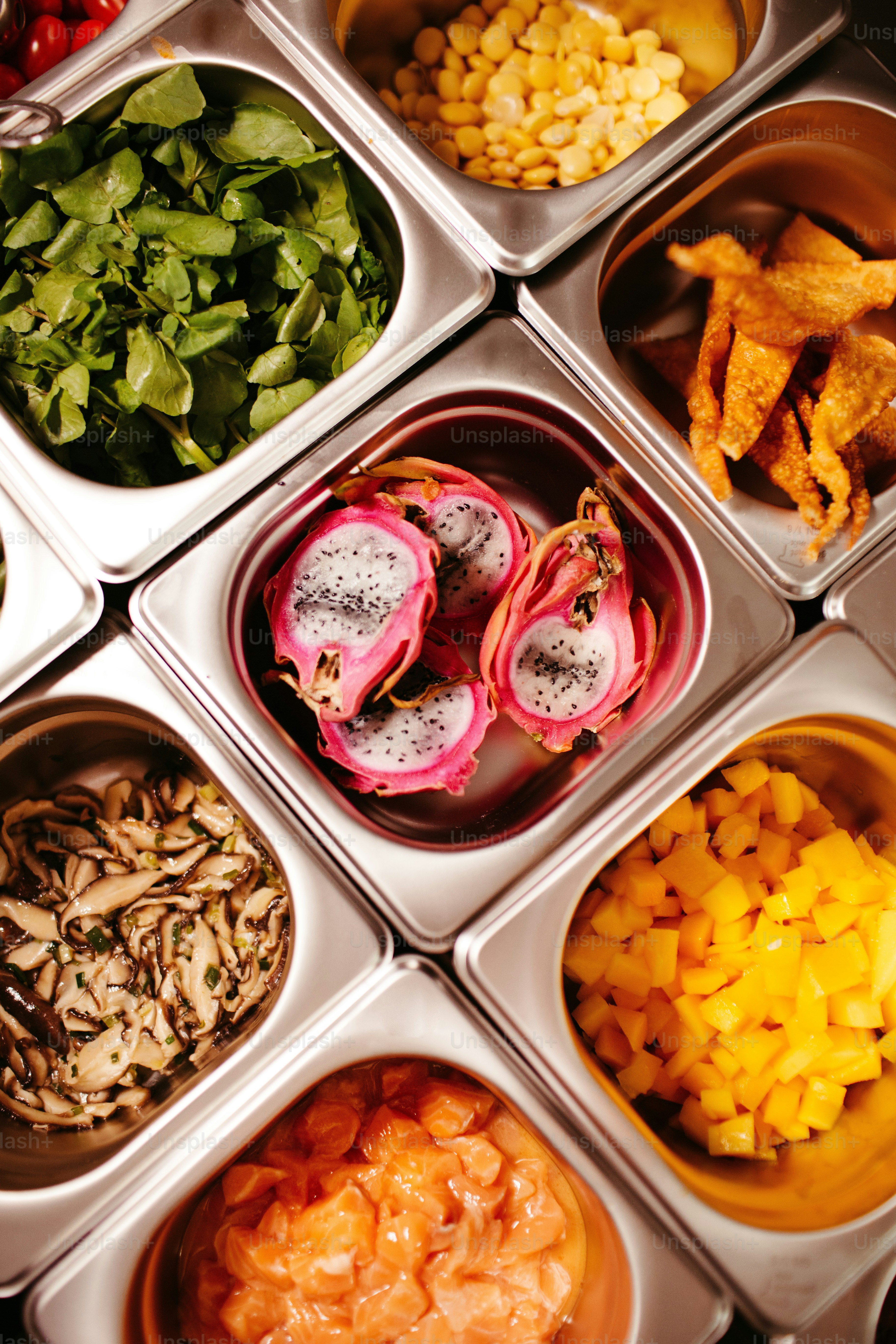 a close up of many different bowls of food