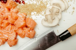 a knife and some food on a table