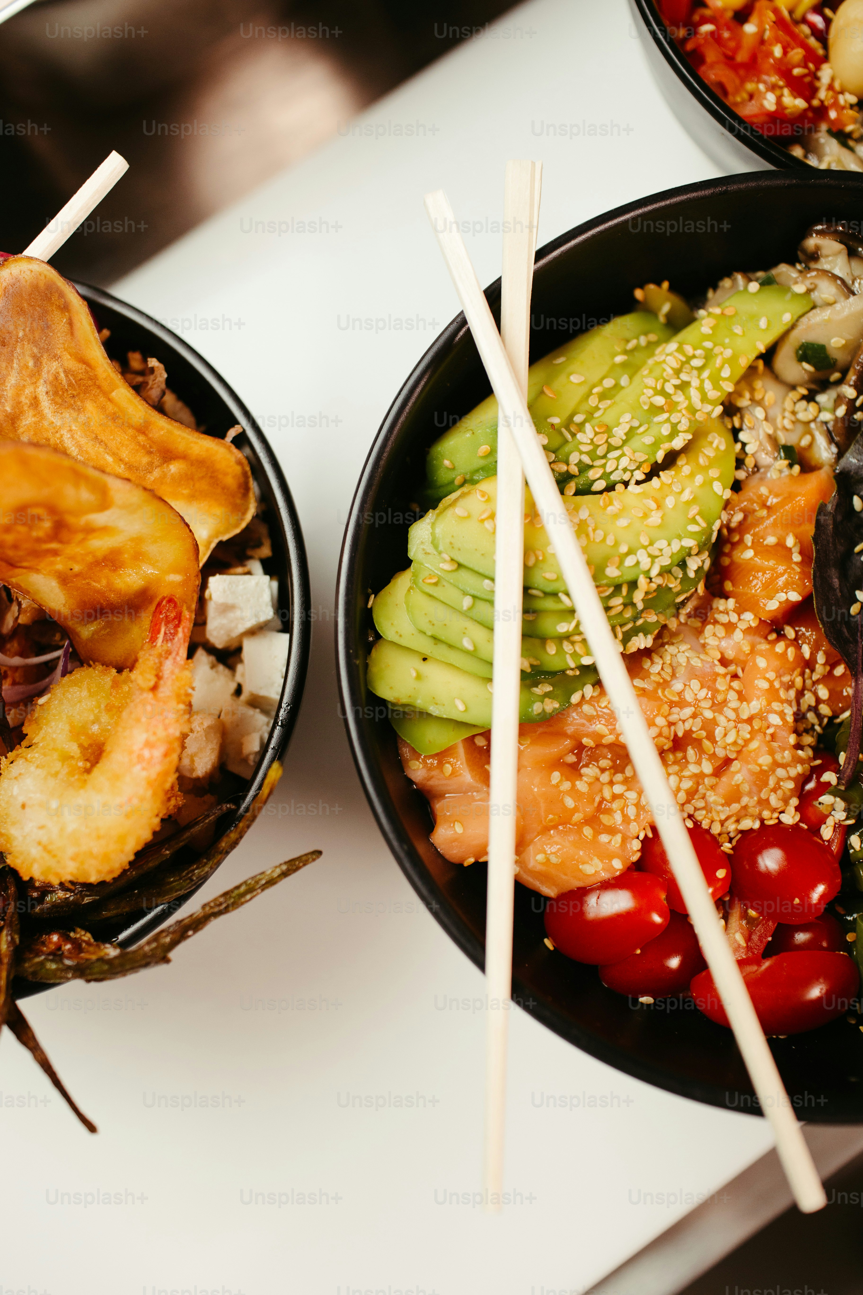 a couple of bowls of food on a table