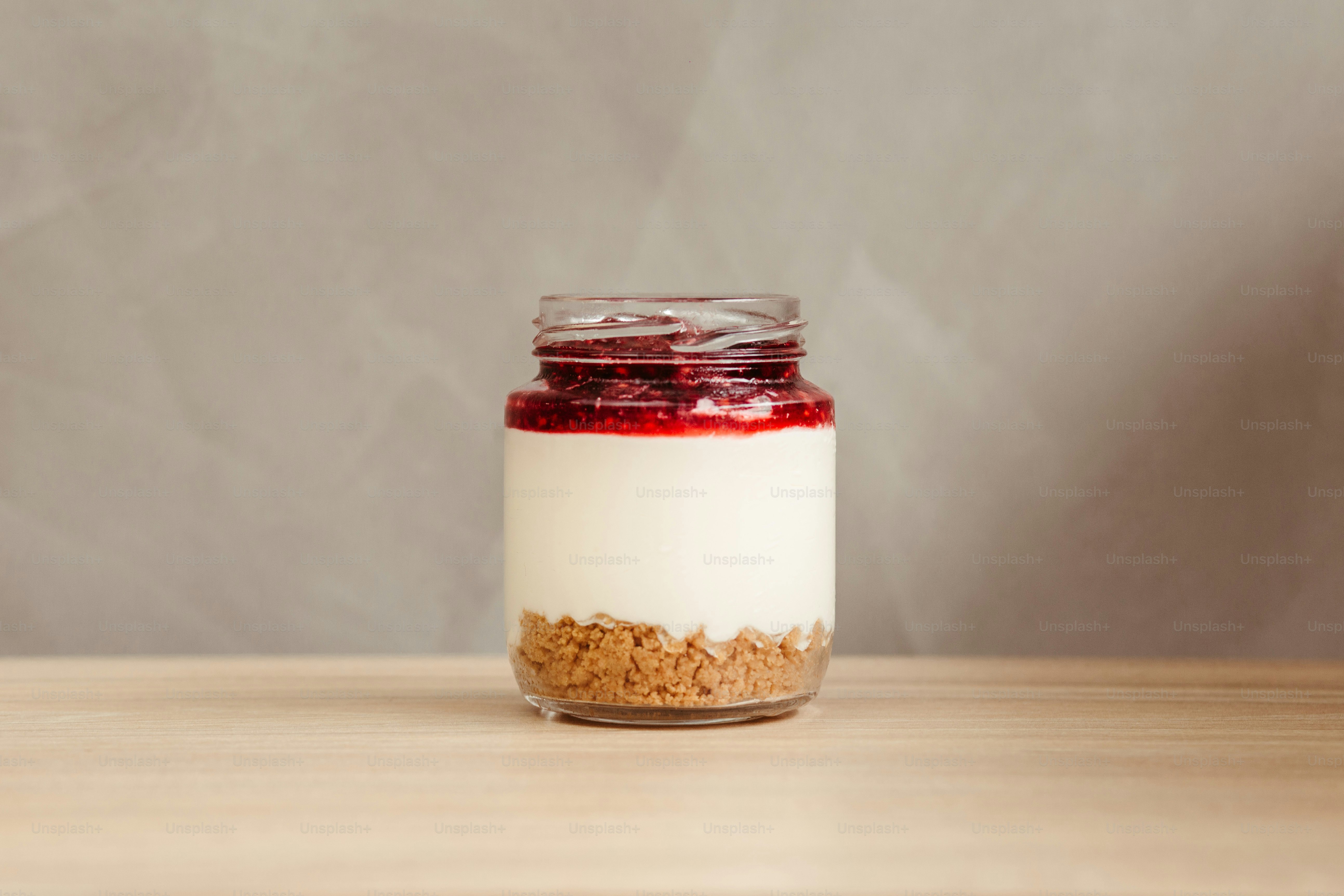 a jar of food sitting on top of a wooden table