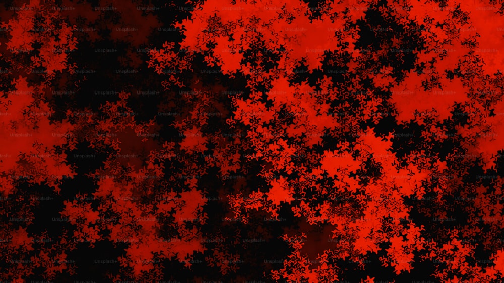 Un fond abstrait rouge et noir avec des étoiles