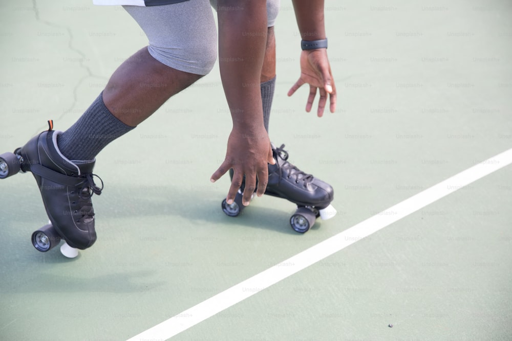 a person on a court with a skateboard