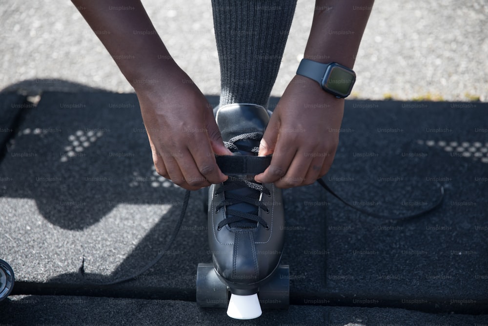 a close up of a person riding a skateboard