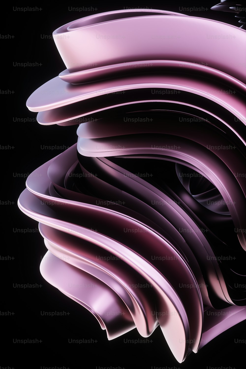 a close up of a purple object on a black background