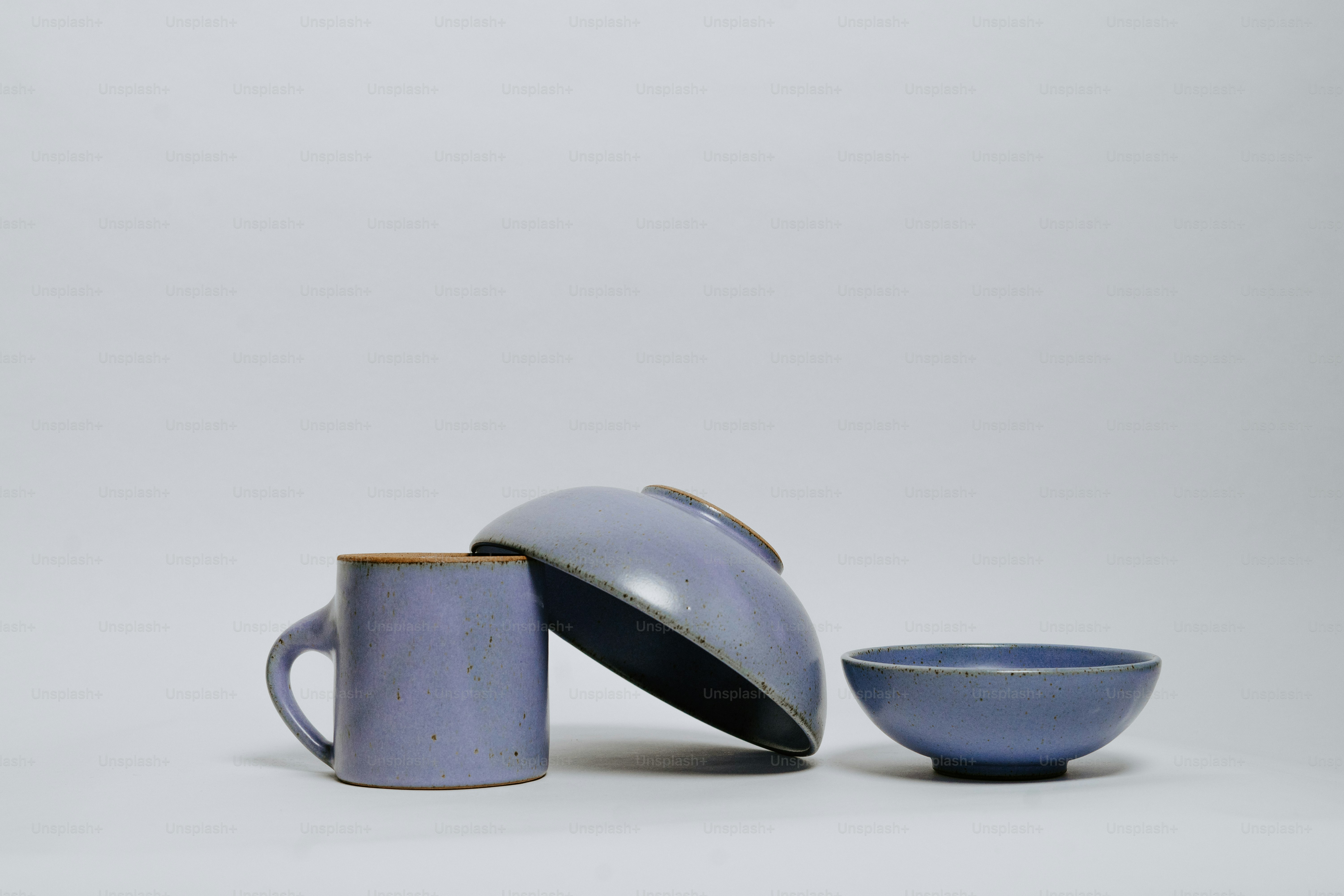 a couple of cups sitting next to each other