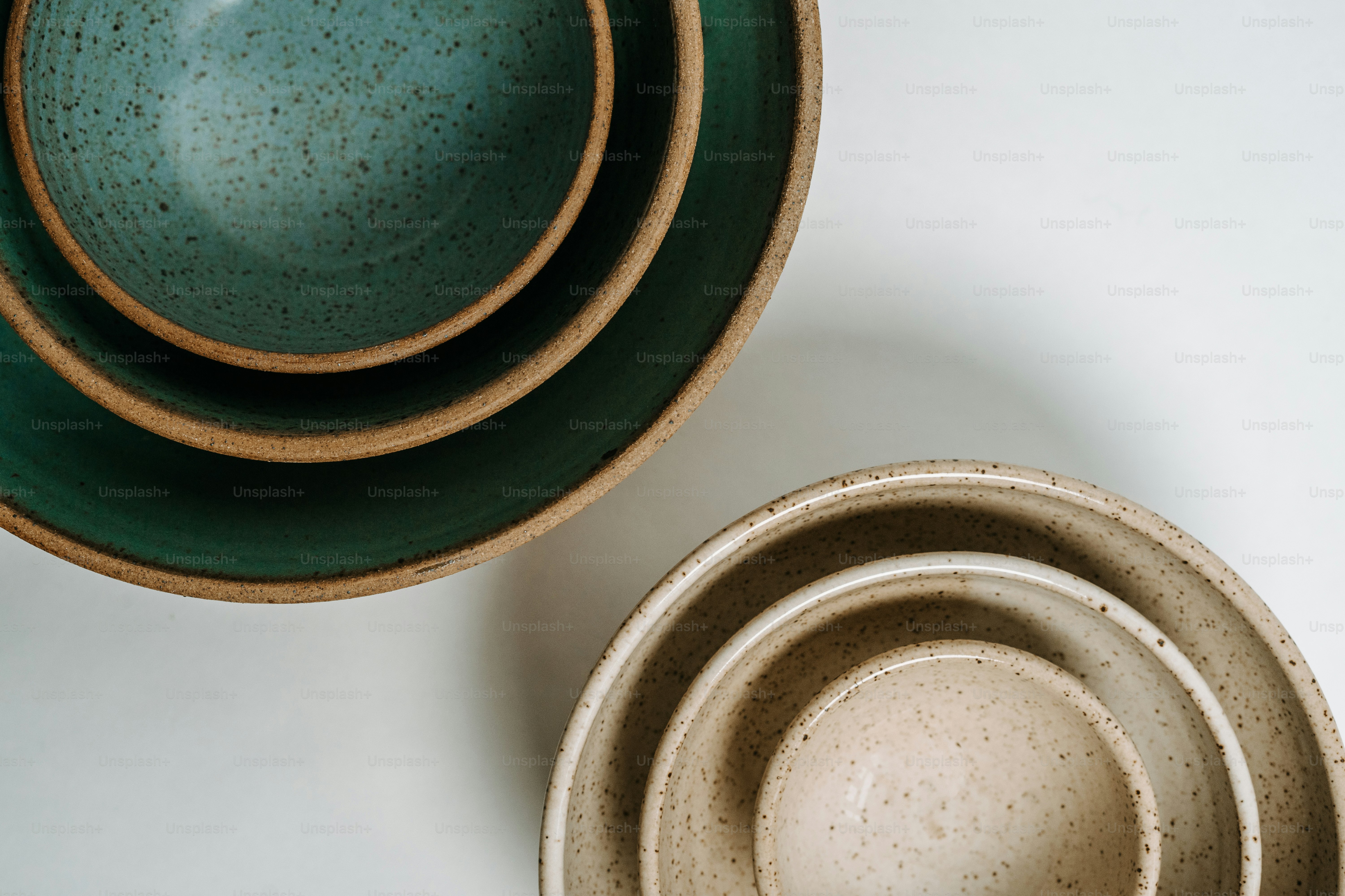 a stack of bowls sitting on top of a table