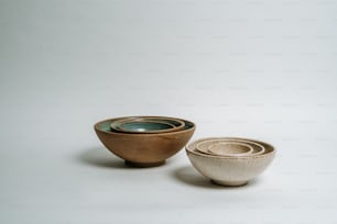 a couple of bowls sitting next to each other