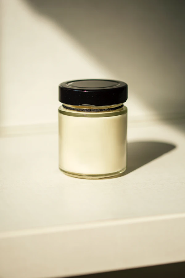 Open jar of barrier repair face cream