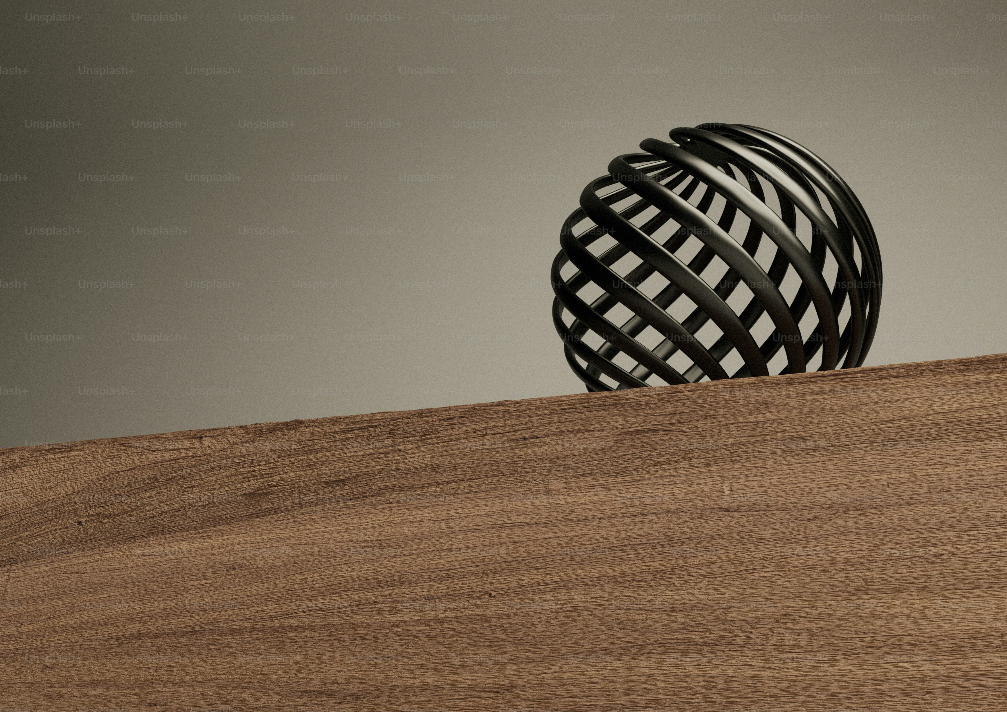 a metal object sitting on top of a wooden table