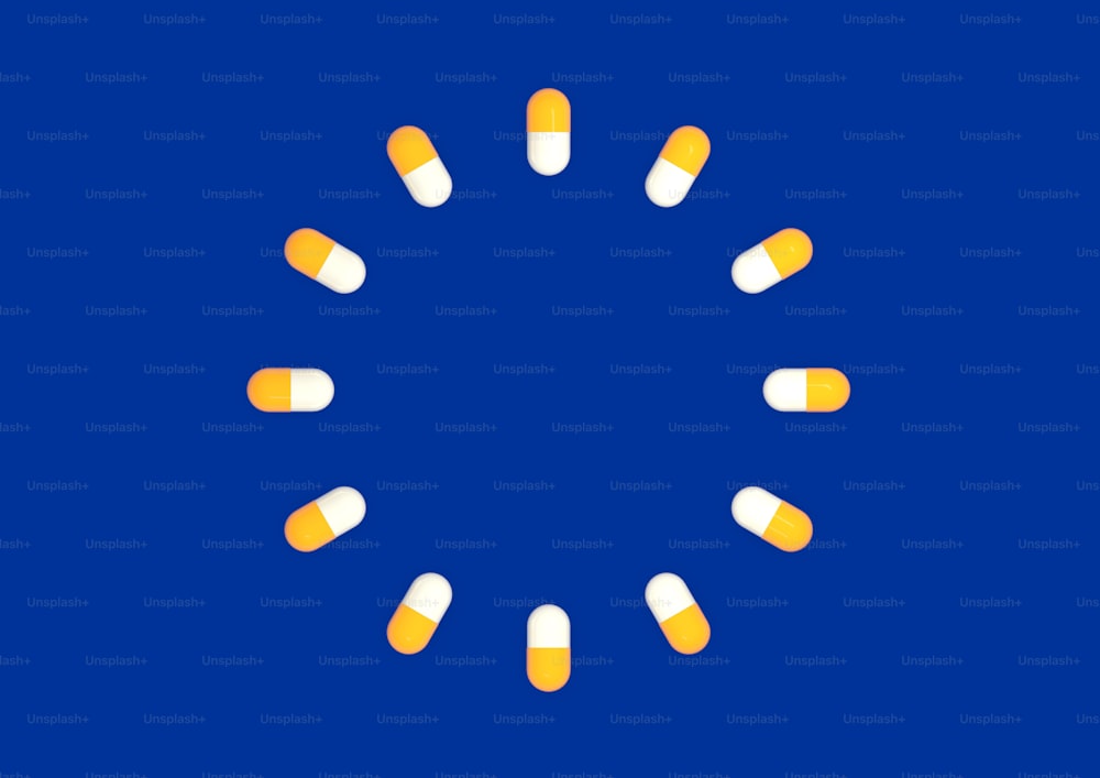 a circle of pills on a blue background