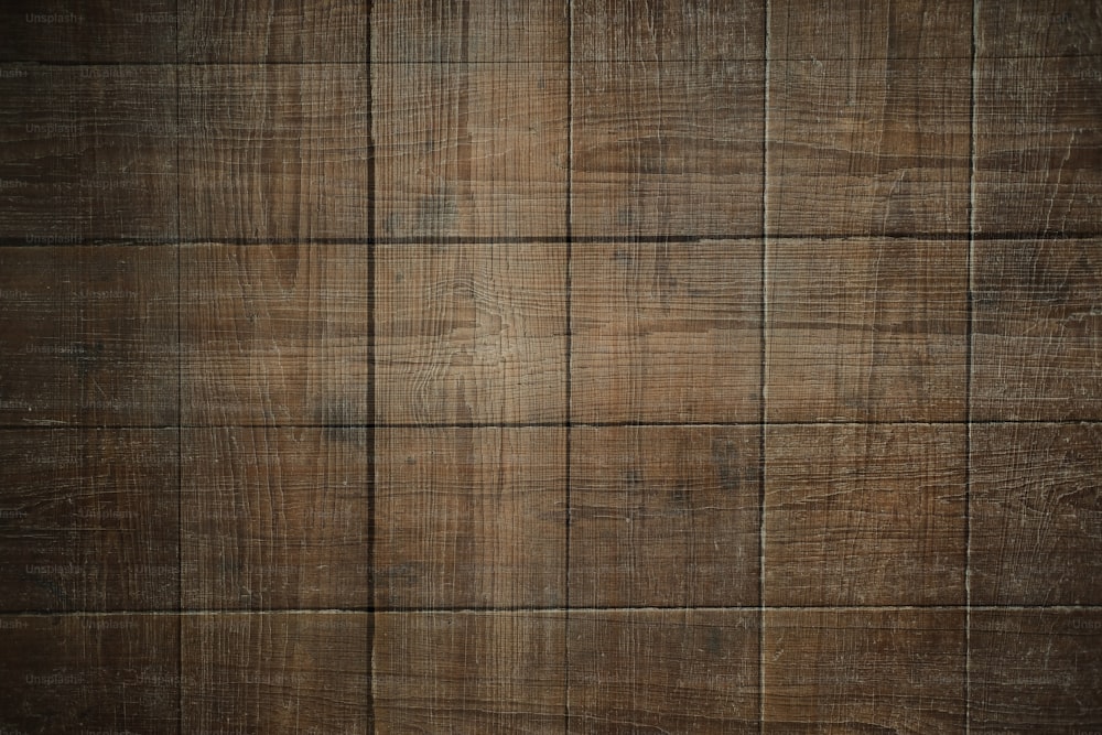 Un fondo de textura de madera marrón con un efecto grunge