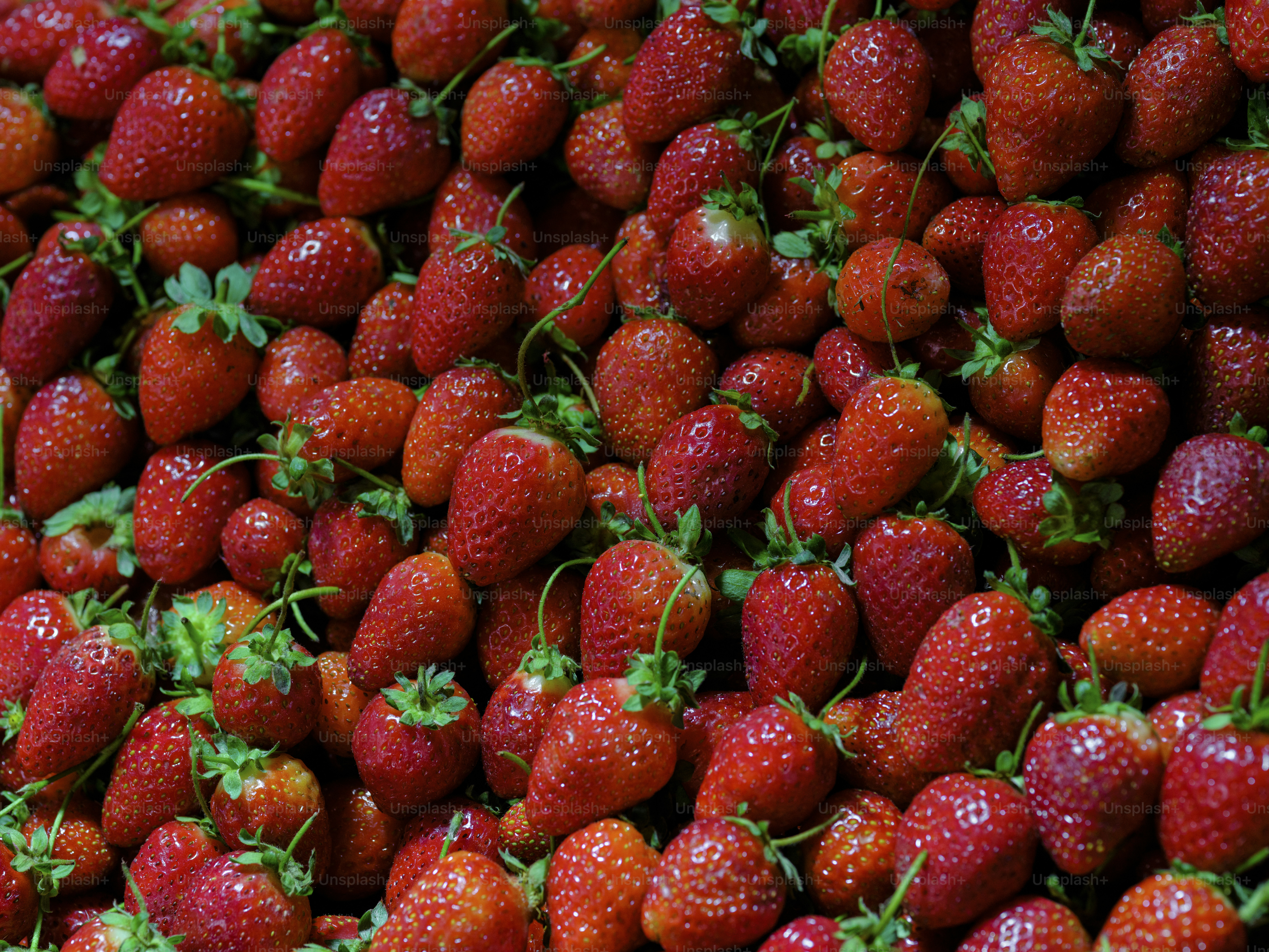 eine Nahaufnahme eines Straußes Erdbeeren