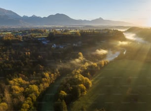 an aerial view of a valley with a river running through it