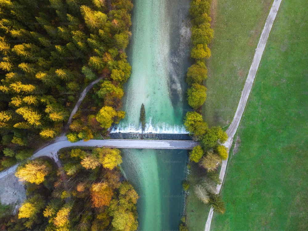 an aerial view of a bridge over a river