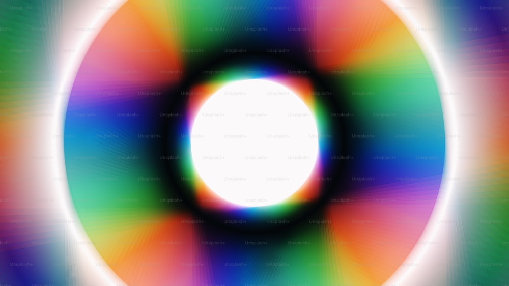 Un círculo de colores del arco iris con un centro blanco