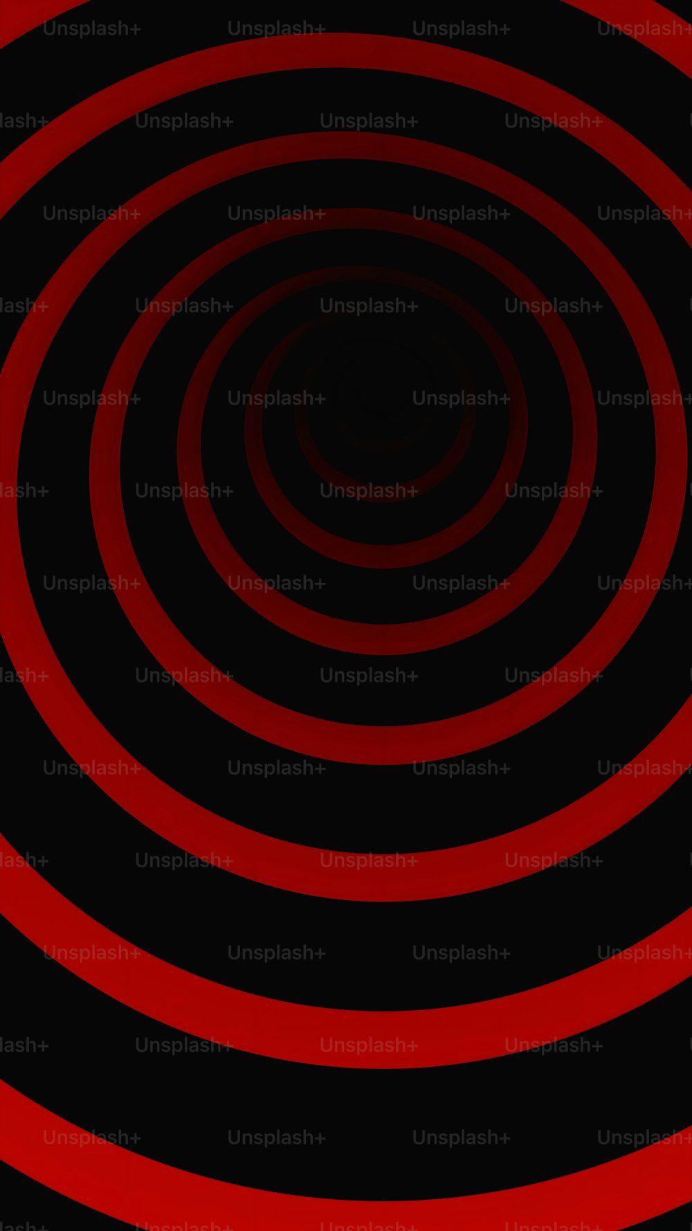 um fundo preto e vermelho com um design circular