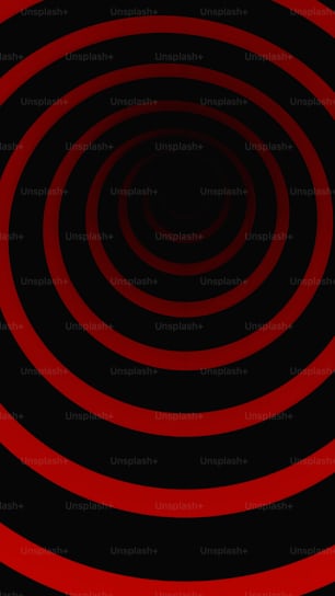 a black and red background with a circular design