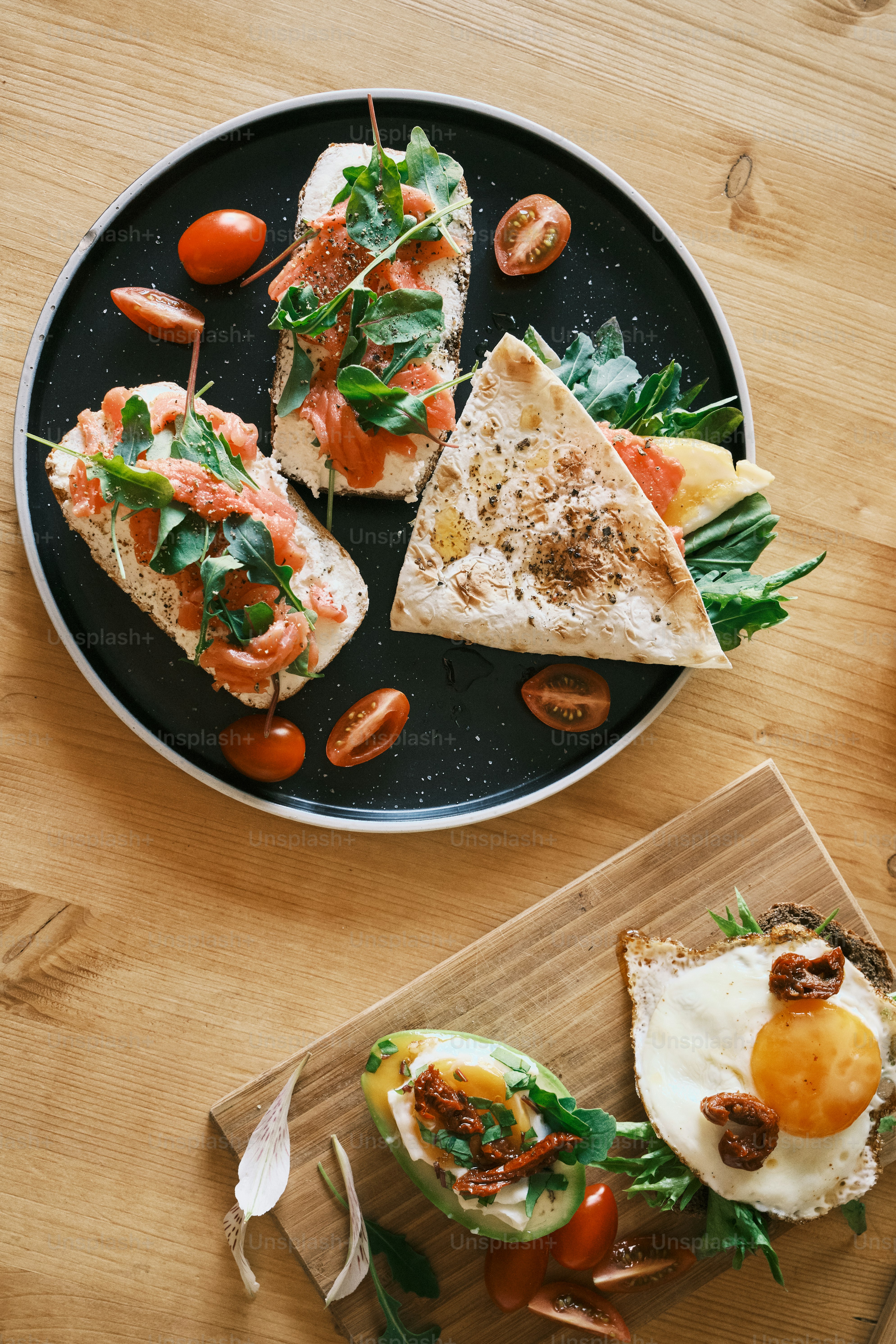 a plate of food on a wooden table