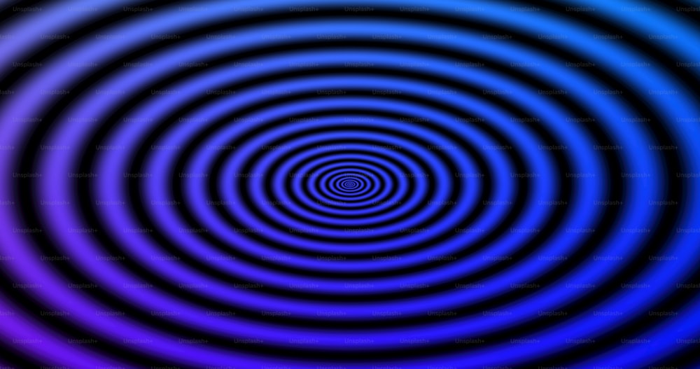 黒の中心を持つ青と紫の円形のパターン