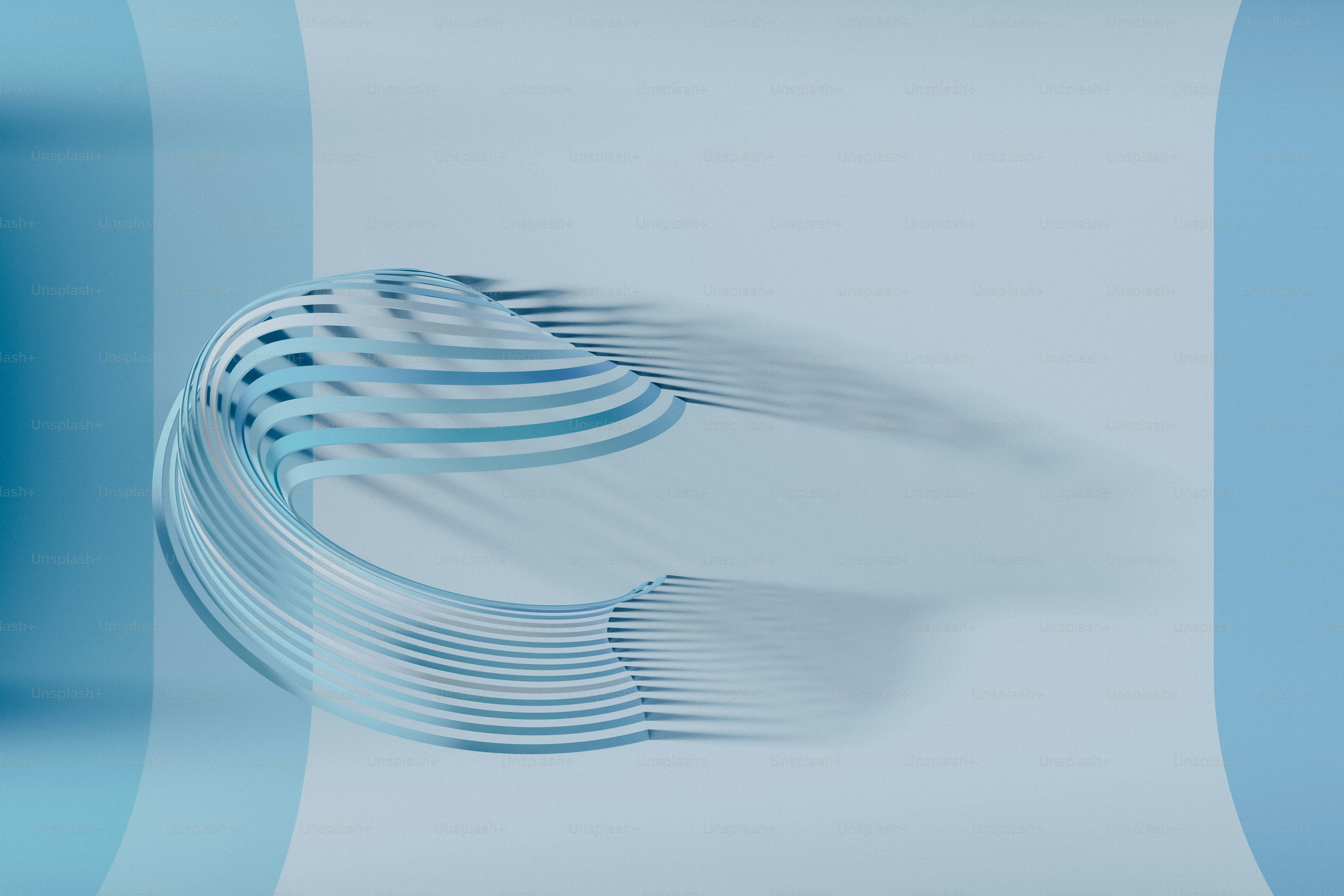 a blue and white background with a curved object