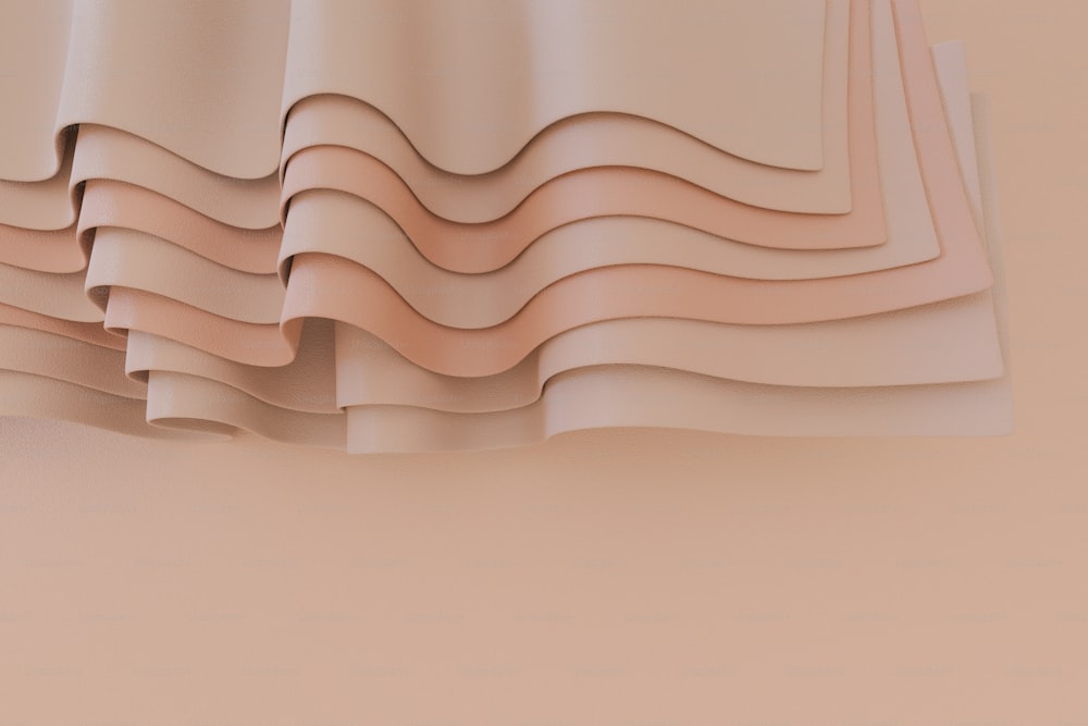 un gros plan d’un morceau de papier aux formes ondulées