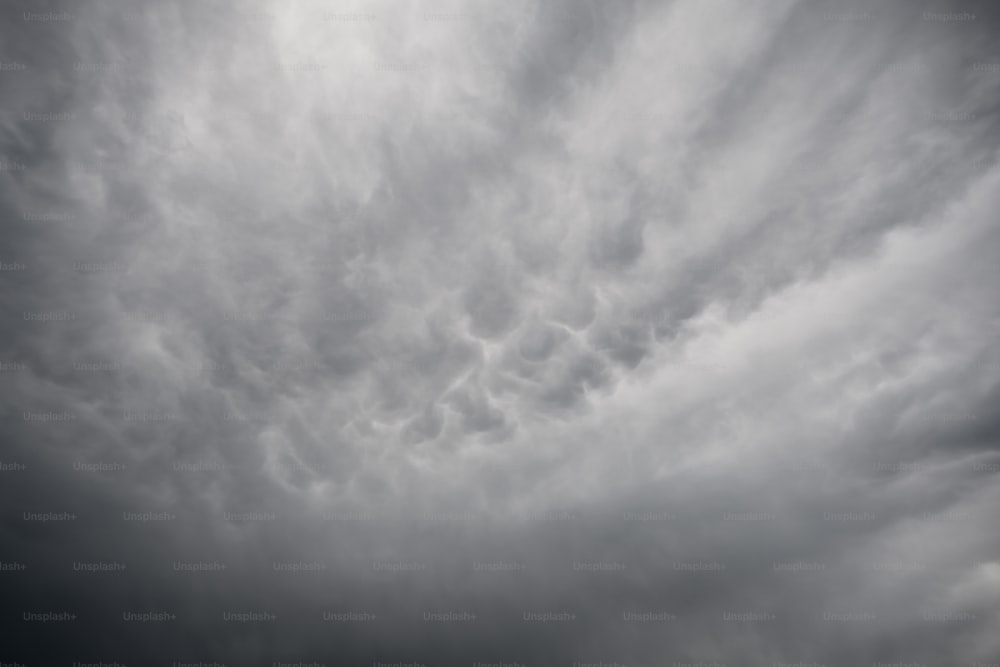 a black and white photo of a cloudy sky