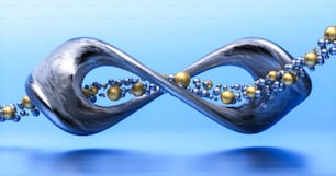 un objet métallique avec des perles dessus et un fond bleu