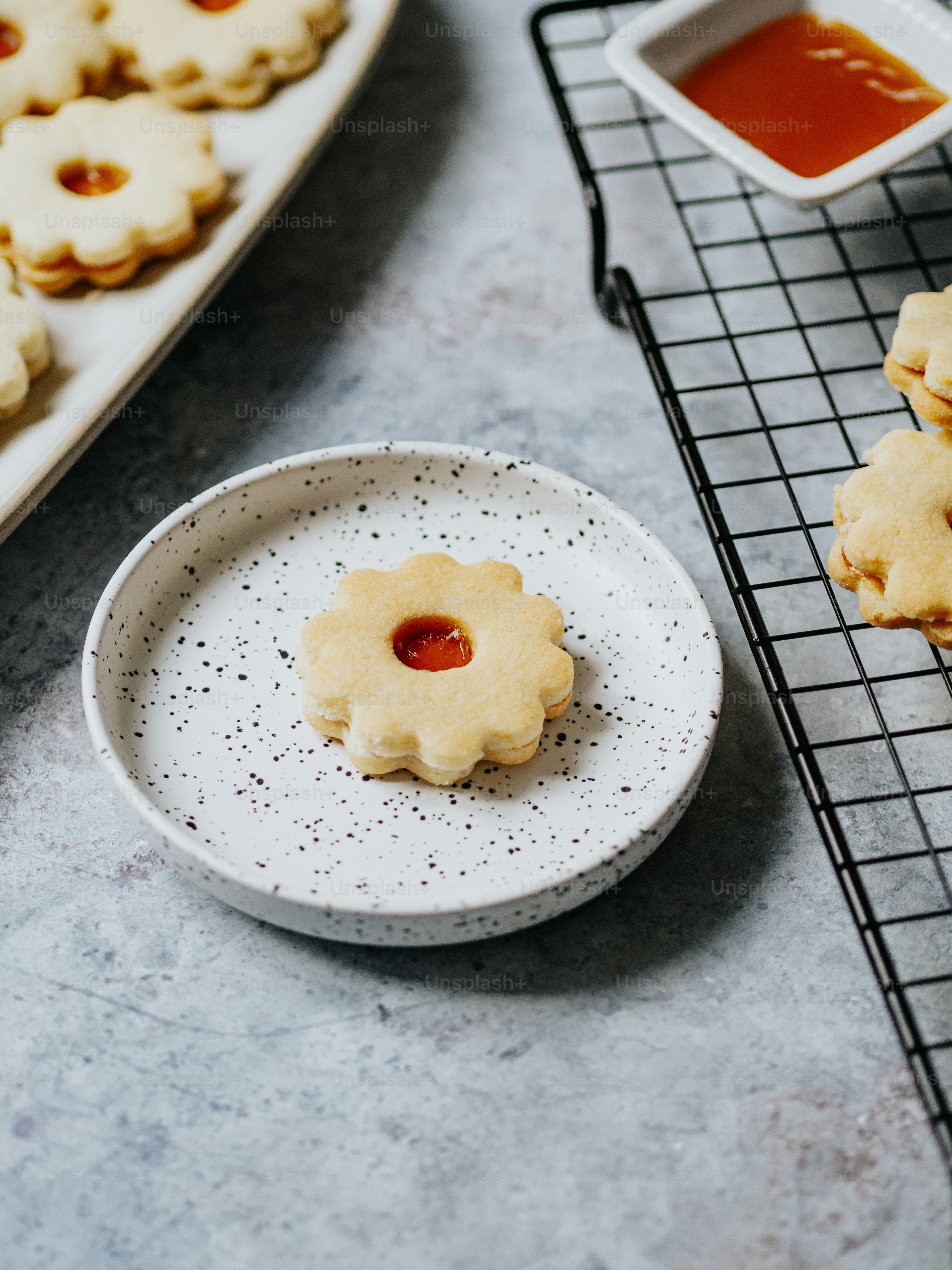 a plate of cookies on a cooling rack