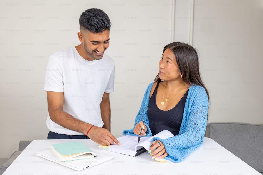 a man and a woman sitting at a table