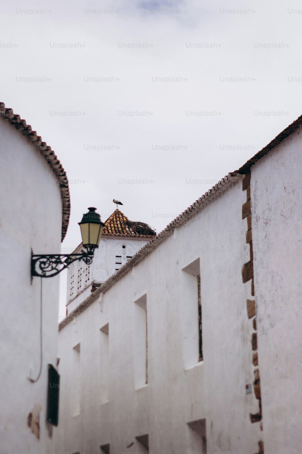 a building with a lamp on top of it