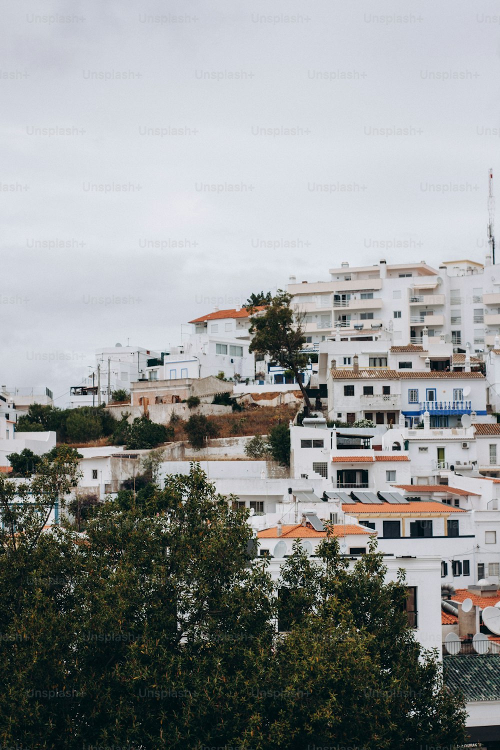 a view of a city with lots of white buildings