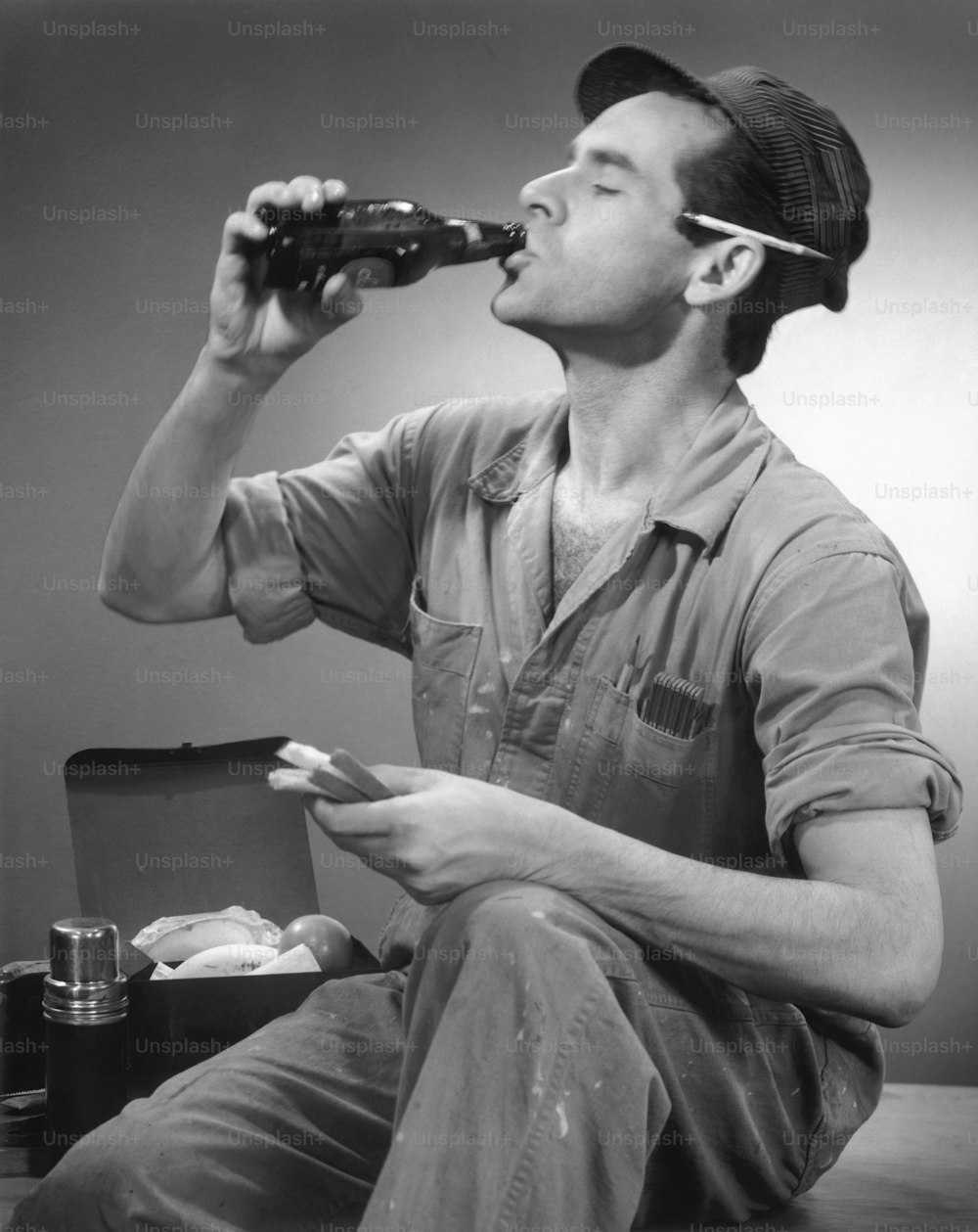 UNITED STATES - CIRCA 1950s:  Worker taking lunch break.