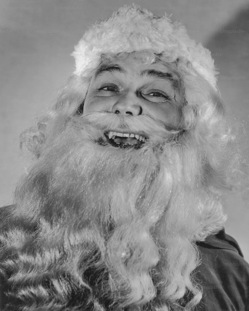 Santa Claus laughing in 1935. (Photo by Keystone View/FPG/Getty Images)