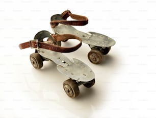 vintage roller skates on white background