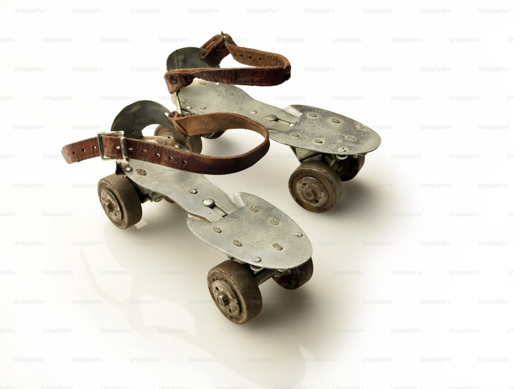 vintage roller skates on white background