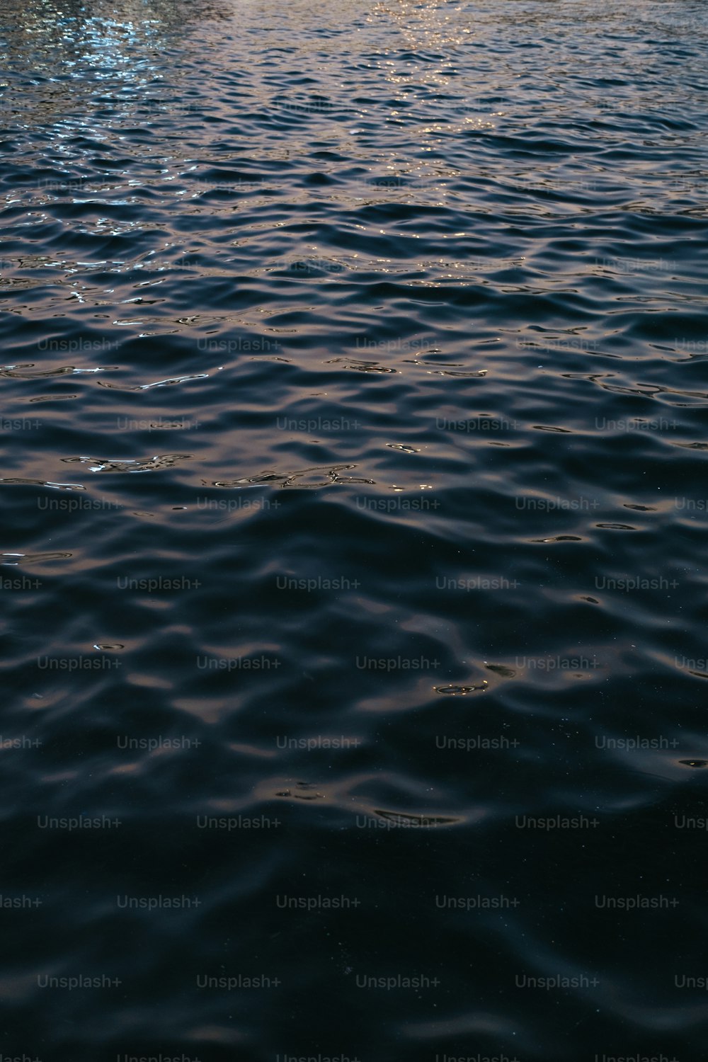 a large boat floating on top of a body of water