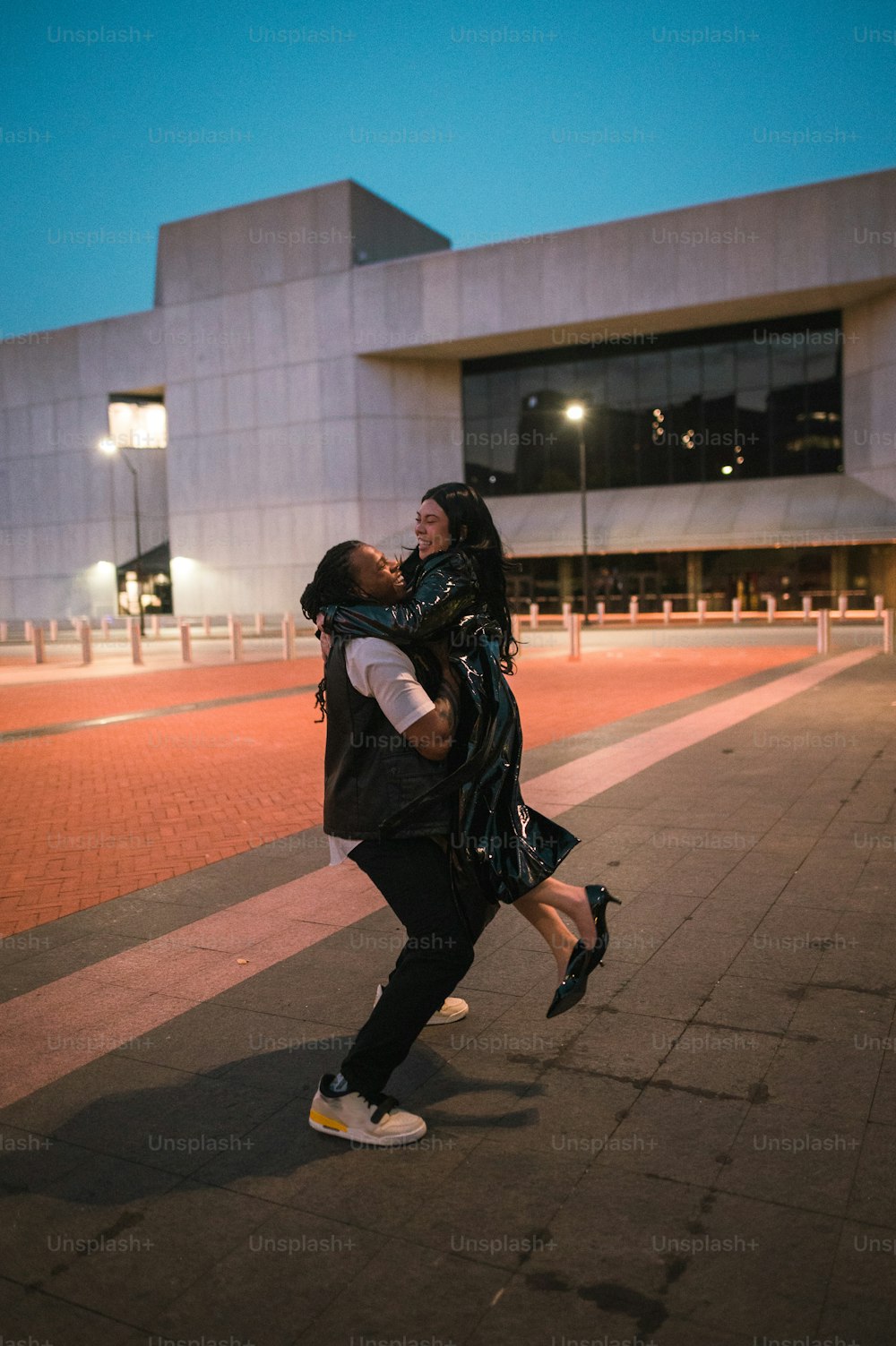 a couple of people that are standing in the street