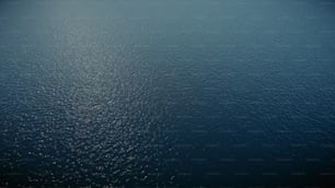 a large body of water with a sky background