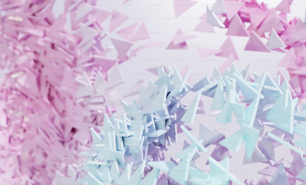 a bunch of pink and blue confetti on a white background