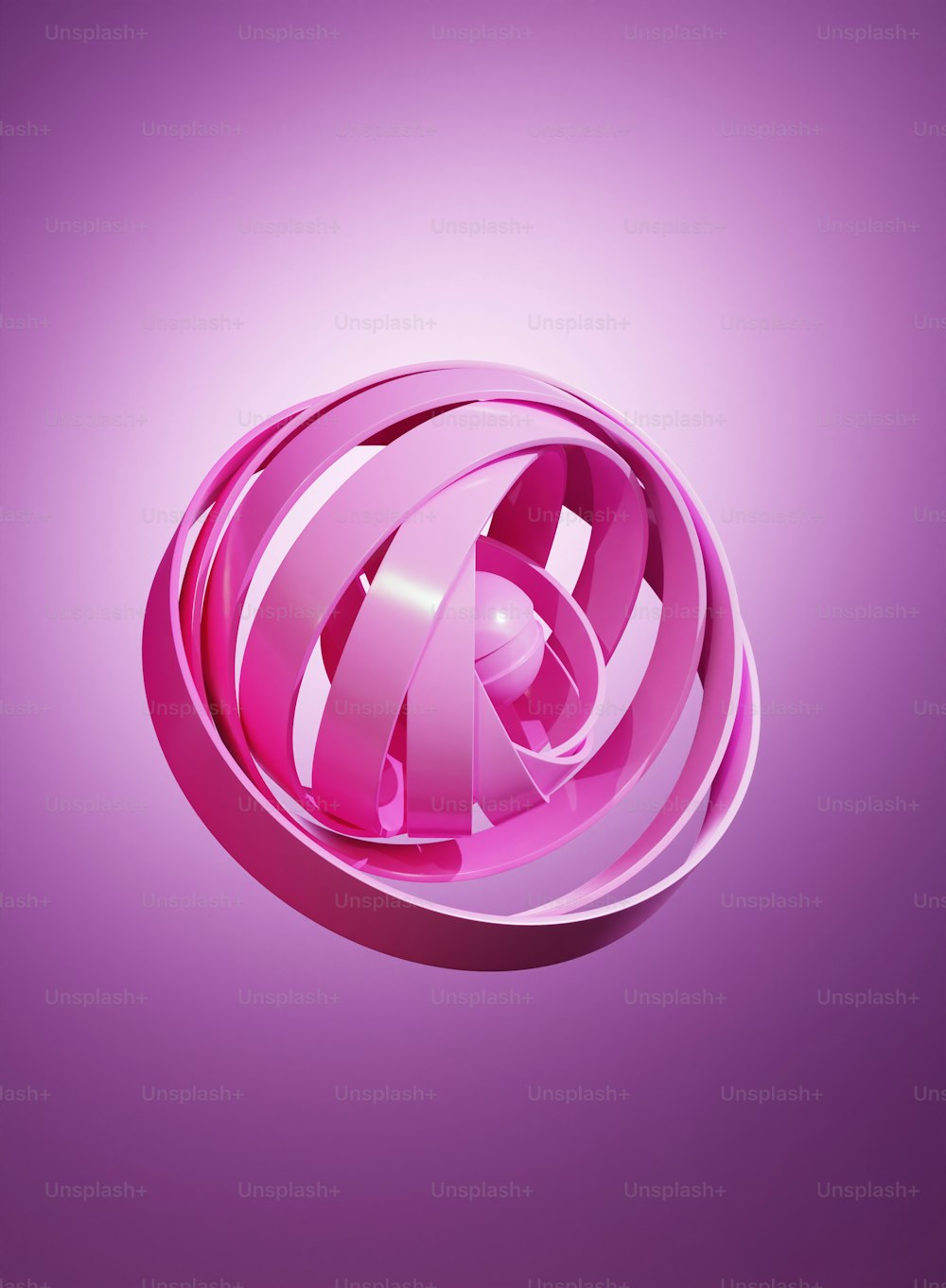 a pink circular object on a purple background