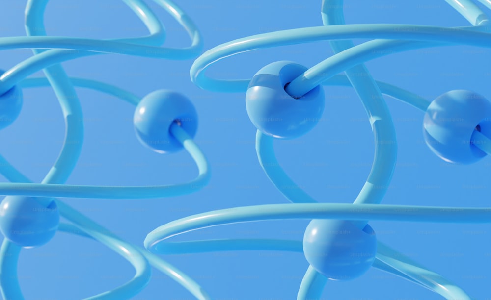 a group of blue balls and wires against a blue sky