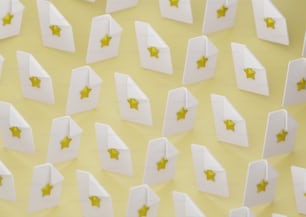 a group of white boxes with yellow stars on them